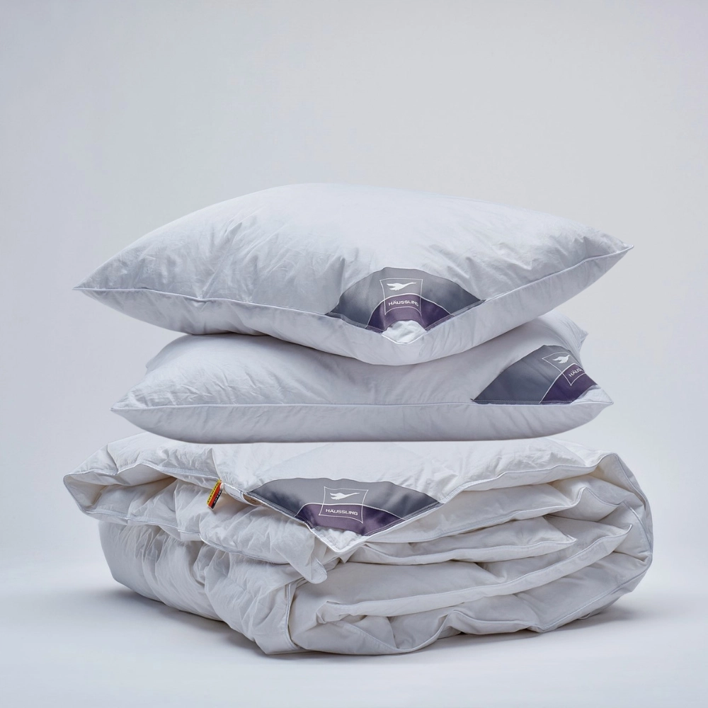 Univerzální péřová přikrývka a polštáře - sada